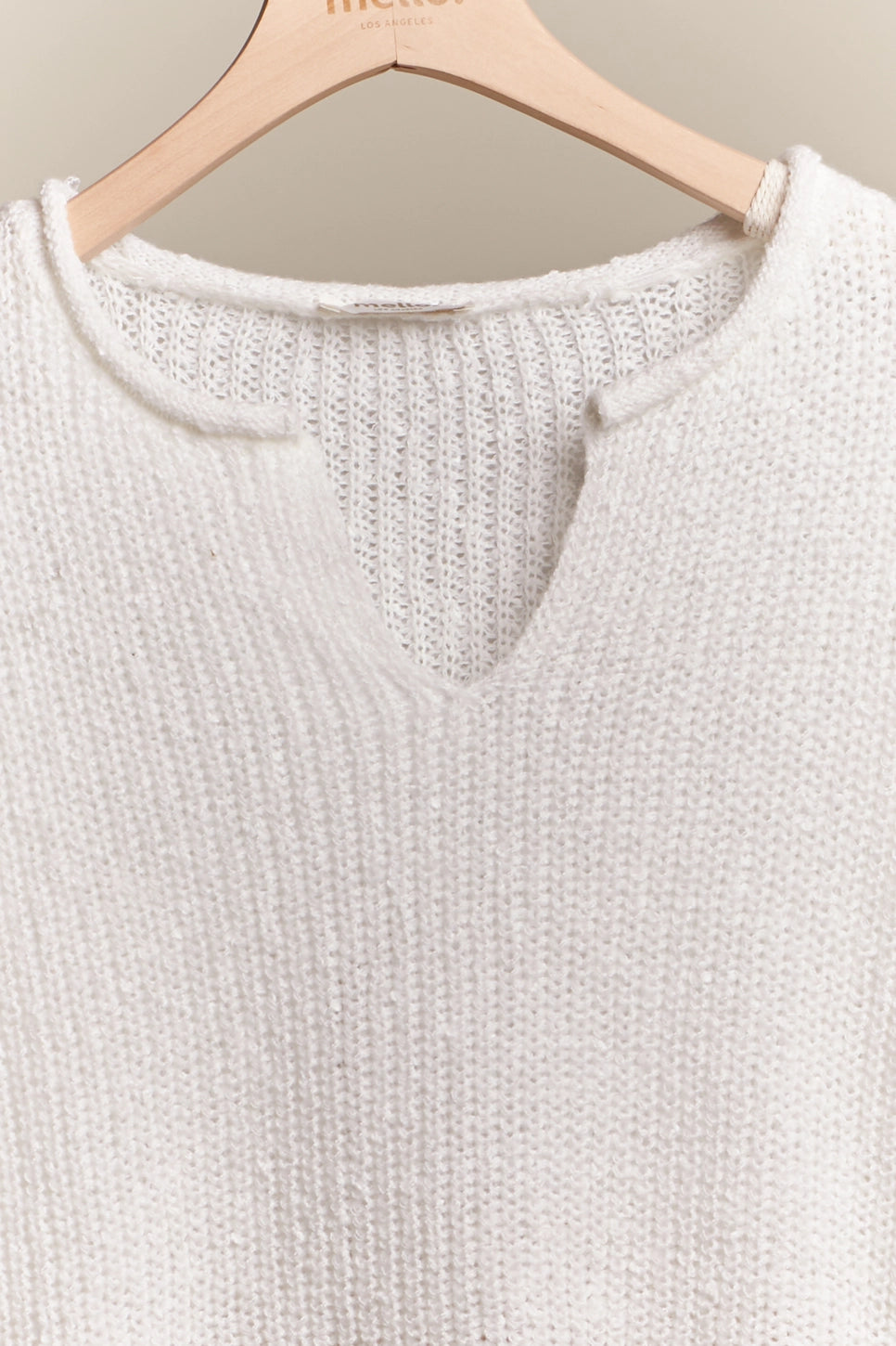 Mello. White Sweater